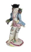 A BOW PORCELAIN MODEL OF A BOY EMBLEMATIC OF AUTUMN FROM A SERIES OF THE FOUR SEASONS, CIRCA 1760