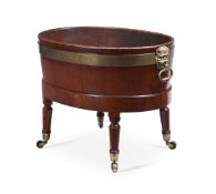 A LATE GEORGE III MAHOGANY BRASS BOUND WINE COOLER AND STAND, FIRST QUARTER 19TH CENTURY