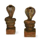 A PAIR OF TERRACOTTA COBRAS, 20TH CENTURY