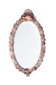 Y A SHELL AND CORAL ENCRUSTED OVAL WALL MIRROR, 1920S AND LATER ENCRUSTED