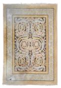 A WOVEN WOOL CARPET IN SAVONNERIE STYLE, 20TH CENTURY