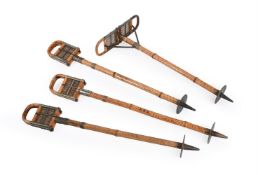 A GROUP OF FOUR METAL MOUNTED BAMBOO FOLDING WALKING SEATS, FRENCH, EARLY 20TH CENTURY
