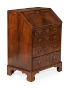 A GEORGE II BURR WALNUT, WALNUT AND FEATHERBANDED BUREAU, MID 18TH CENTURY