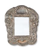 SOUTH AMERICAN OR MEXICAN, A REPOUSSÉ MIRROR, LATE 19TH/ EARLY 20TH CENTURY