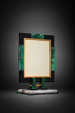 OSTERTAG (PARIS), AN ART DECO MALACHITE, ONYX AND ENAMEL PICTURE FRAME, CIRCA 1934