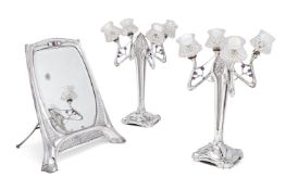 ORIVIT (GERMAN), ART NOUVEAU SILVERED PAIR OF FOUR BRANCH CANDELABRA; CIRCA 1890