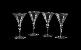 PHILIP WEBB (BRITISH, 1831-1915), FOR JAMES POWELL & SONS, SET OF FOUR DRINKING GLASSES; CIRCA 1870