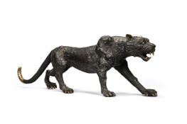 A LARGE CAST, PATINATED AND PARCEL GILT BRONZE FIGURE OF A LEOPARD, MODERN