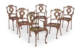 A SET OF SIX CAST METAL GARDEN ARMCHARS, IN THE MANNER OF THOMAS CHIPPENDALE, OF RECENT MANUFACTURE