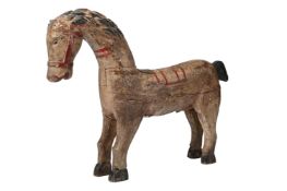 A NAIVE CARVED AND PAINTED FIGURE OF A HORSE, PROBABLY FIRST HALF 20TH CENTURY