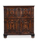 AN OAK ENCLOSED CHEST, CIRCA 1680 AND LATER