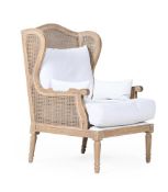 A LIMED OAK BERGERE ARMCHAIR BY CHAIRS LIMITED, IN LOUIS XVI STYLE, MODERN