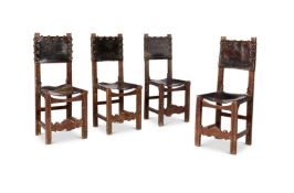 A SET OF FOUR OAK AND LEATHER SIDE CHAIRS, IN SPANISH 17TH CENTURY STYLE, 19TH CENTURY