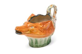 A STAFFORDSHIRE CREAMWARE PRATT-TYPE FOX-MASK SAUCEBOAT, CIRCA 1790