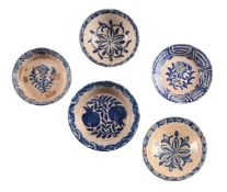 FIVE SPANISH MAIOLICA BLUE AND WHITE DISHES, VARIOUS DATES 19TH AND 20TH CENTURIES