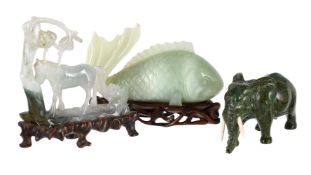 A CHINESE JADEITE CARVING OF A FISH, MID 20TH CENTURY, TOGETHER WITH TWO OTHER CARVINGS