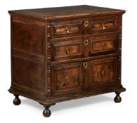 A CHARLES II OAK AND WALNUT CHEST OF DRAWERS, CIRCA 1680