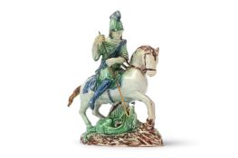 A STAFFORDSHIRE PEARLWARE MODEL OF ST. GEORGE AND THE DRAGON OF RALPH WOOD TYPE, 18TH CENTURY