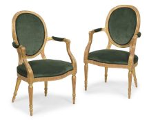 A MATCHED PAIR OF CARVED WOOD AND GILT GESSO OPEN ARMCHAIRS, LATE 18TH CENTURY AND A LATER COPY
