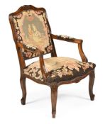 A CARVED BEECH FAUTEUIL ARMCHAIR, FRENCH, IN THE LOUIS XV STYLE, FIRST QUARTER 20TH CENTURY