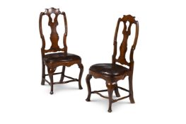 A PAIR OF WALNUT LEATHER UPHOLSTERED SIDE CHAIRS, SPANISH, LATE 18TH OR EARLY 19TH CENTURY