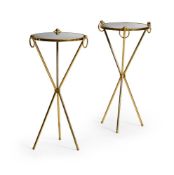 A PAIR OF MIRROR TOPPED GILT METAL CIRCULAR SIDE TABLES, IN THE MANNER OF JACQUES ADNET, MODERN