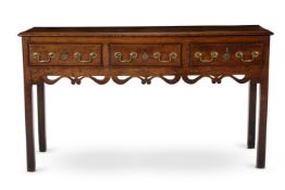 A GEORGE III OAK AND ELM DRESSER BASE, PROBABLY WELSH, CIRCA 1770
