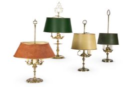 A GROUP OF FOUR BRASS AND TOLE PEINTE SHADE BOUILLOTTE TABLE LAMPS, PROBABLY PORTUGUESE OR SPANISH