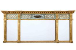 A REGENCY GILTWOOD AND VERRE EGLOMISE TRIPLE PLATE OVERMANTEL MIRROR, EARLY 19TH CENTURY