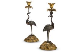 A PAIR OF VICTORIAN GILT METAL MOUNTED BRONZE CANDLESTICKS, MID 19TH CENTURY