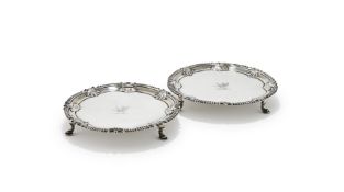 A MATCHED PAIR OF GEORGE III SILVER SHAPED CIRCULAR SALVERS, DAVID BELL, LONDON 1761 AND 1764