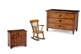A FIGURED WALNUT MINIATURE COMMODE, CONTINENTAL, 19TH CENTURY