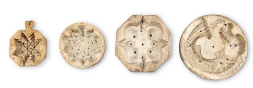 A COLLECTION OF FOUR SYCAMORE CHEESE AND BREAD MOULDS, 19TH CENTURY