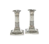 A PAIR OF VICTORIAN SILVER CANDLESTICKS, WILLIAM HUTTON & SONS LTD., LONDON 1895