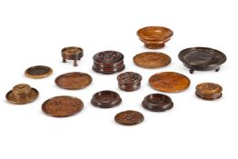 Y A COLLECTION OF FIFTEEN TREEN TURNED BOWLS, BOXES, COASTERS AND STANDS, MOSTLY 19TH CENTURY