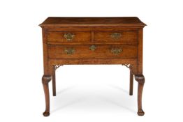 A GEORGE II OAK LOWBOY, CIRCA 1750