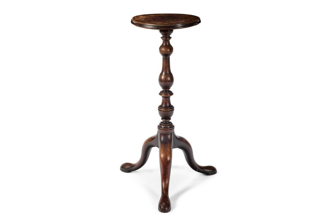 A GEORGE II MAHOGANY TORCHERE, CIRCA 1750