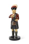 A TOBACCONIST'S POLYCHROME DECORATED CARVED WOOD SHOP 'HIGHLANDER' FIGURE, 20TH CENTURY