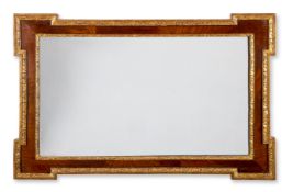 A WALNUT AND PARCEL GILT MIRROR, OF GEORGE II STYLE, EARLY 20TH CENTURY