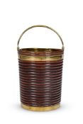 AN IRISH GEORGE III BRASS BOUND MAHOGANY PEAT BUCKET, PROBABLY EARLY 19TH CENTURY