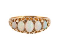 AN EARLY 20TH CENTURY OPAL FIVE STONE RING