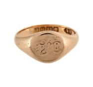 AN 18 CARAT GOLD SIGNET RING
