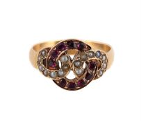 A RUBY AND HALF PEARL DRESS RING
