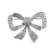 A DIAMOND BOW BROOCH