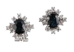 A PAIR OF SAPPHIRE AND DIAMOND CLUSTER EARRINGS