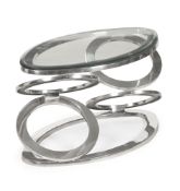 A SMALL OVAL POLISHED METAL SIDE TABLE WITH GLASS TOP, MODERN