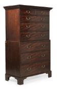 A GEORGE III FIGURED MAHOGANY CHEST ON CHEST, CIRCA 1780