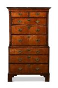 A GEORGE II WALNUT AND CROSSBANDED CHEST ON CHEST, CIRCA 1740