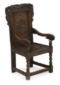 A CHARLES II OAK WAINSCOTT ARMCHAIR, POSSIBLY WEST MIDLANDS, CIRCA 1680