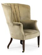 A GEORGE III MAHOGANY AND UPHOLSTERED BARREL BACK ARMCHAIR, CIRCA 1800